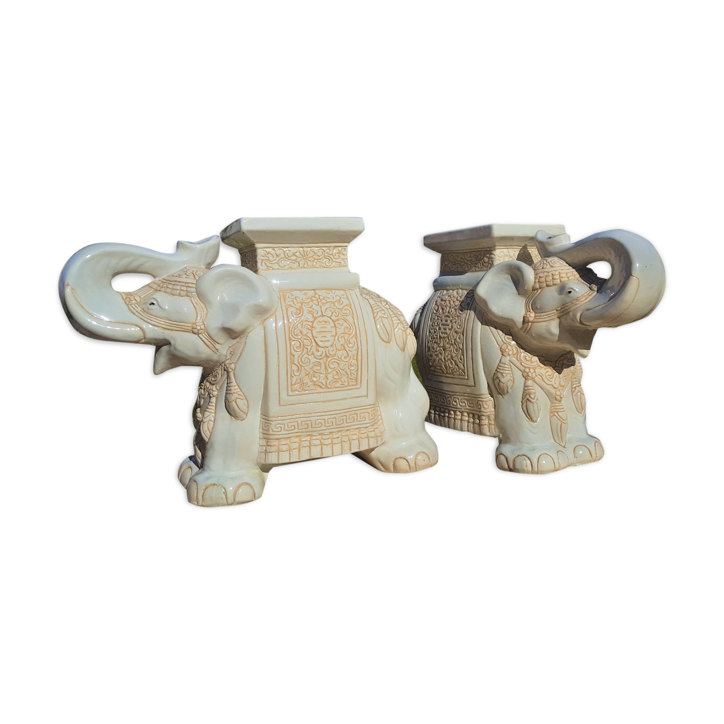 Pair of enamelled white ceramic elephant harnesses