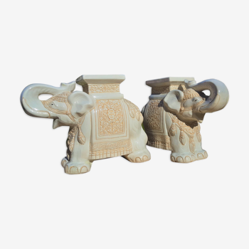 Pair of enamelled white ceramic elephant harnesses