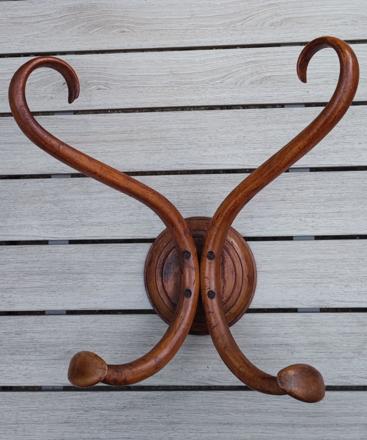 Curved wooden coat hook, circa 1900
