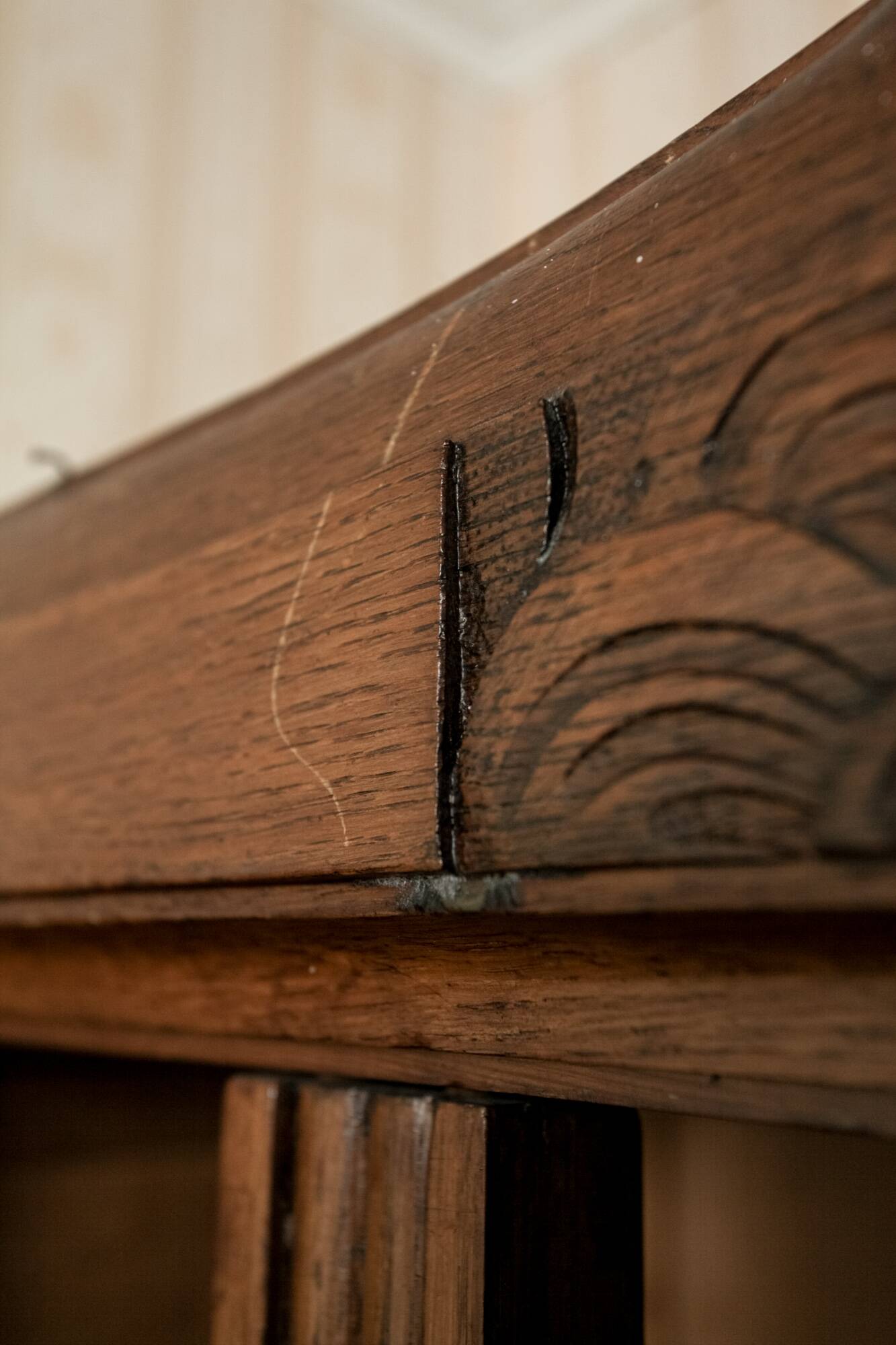 Old solid wood wardrobe with three vintage mirror doors