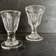 Set of antique liqueur glasses in thick glass, bistro style.