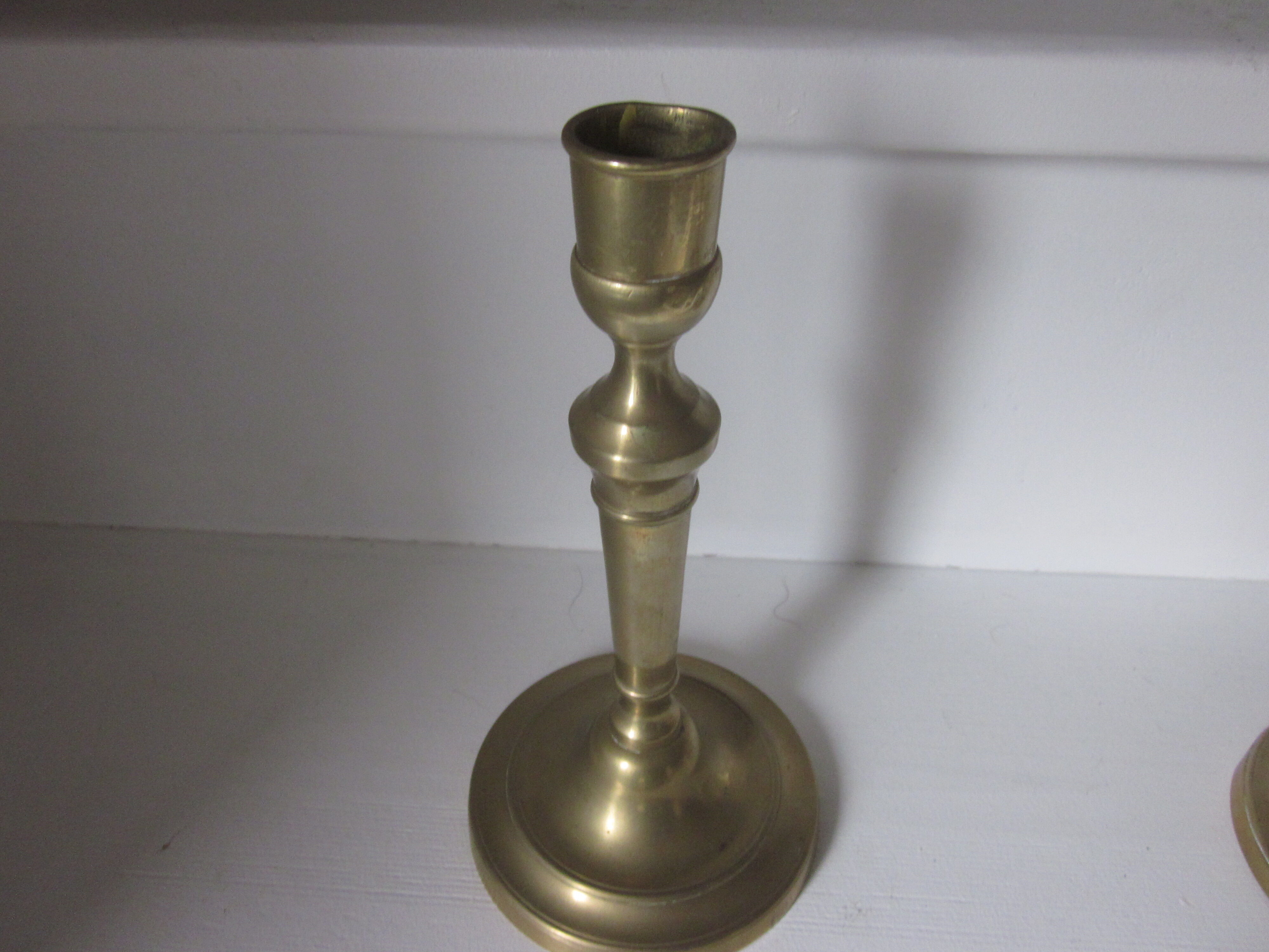 Pair of old bronze candlesticks