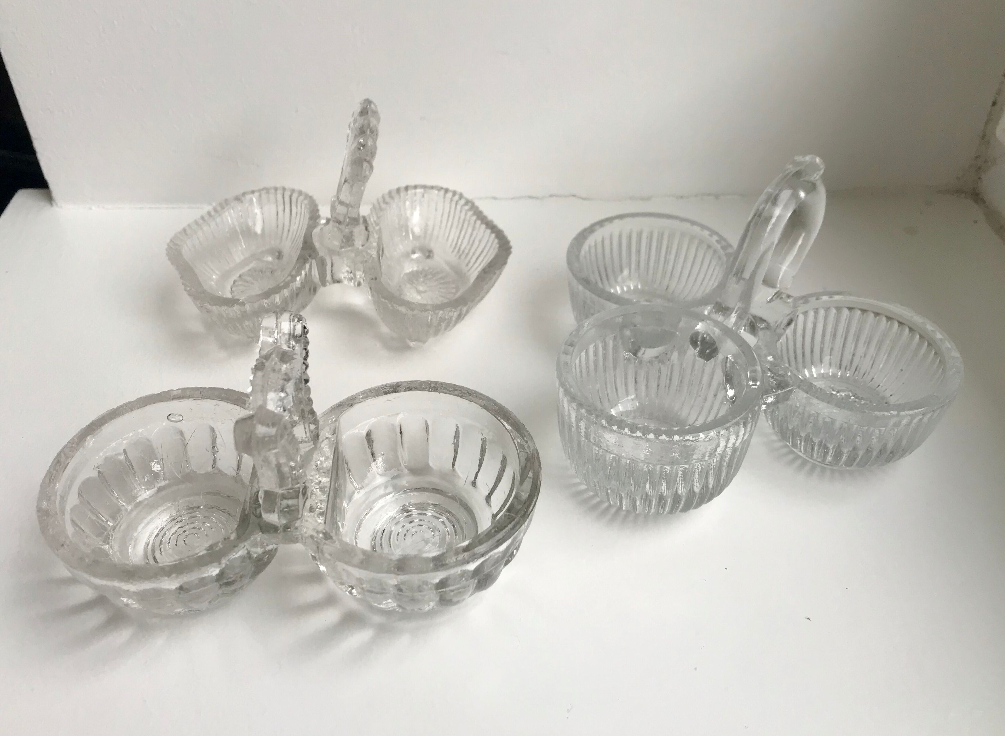 Trio of mismatched salt shakers in molded pressed glass 50s