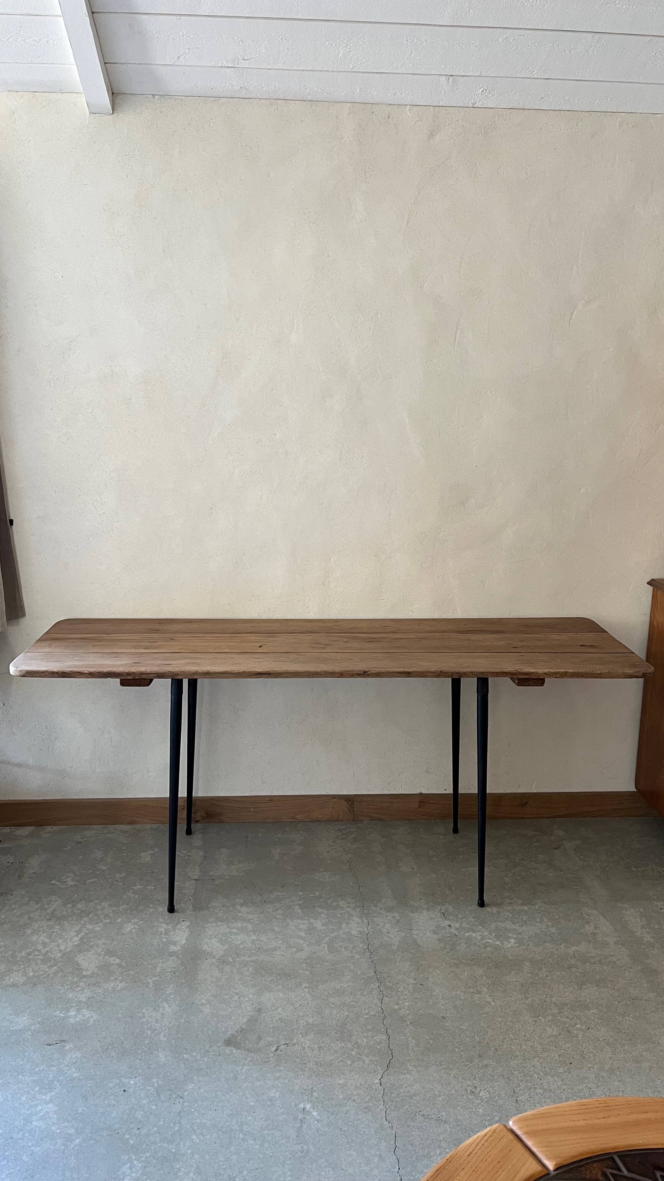 Wooden table, black metal legs