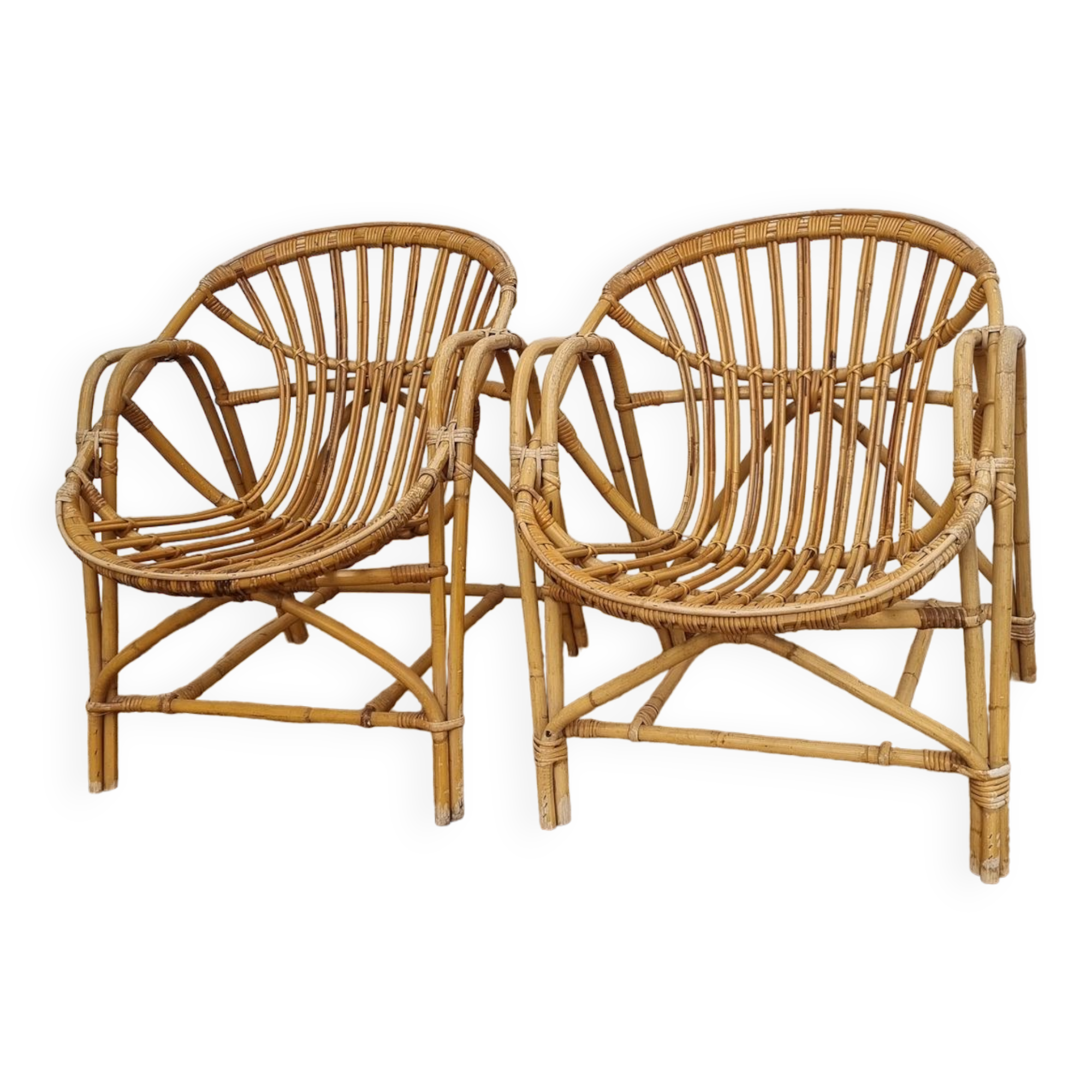 pair of Coquille rattan armchairs