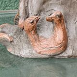 Lamp base in sculpted terracotta featuring birds, signed.