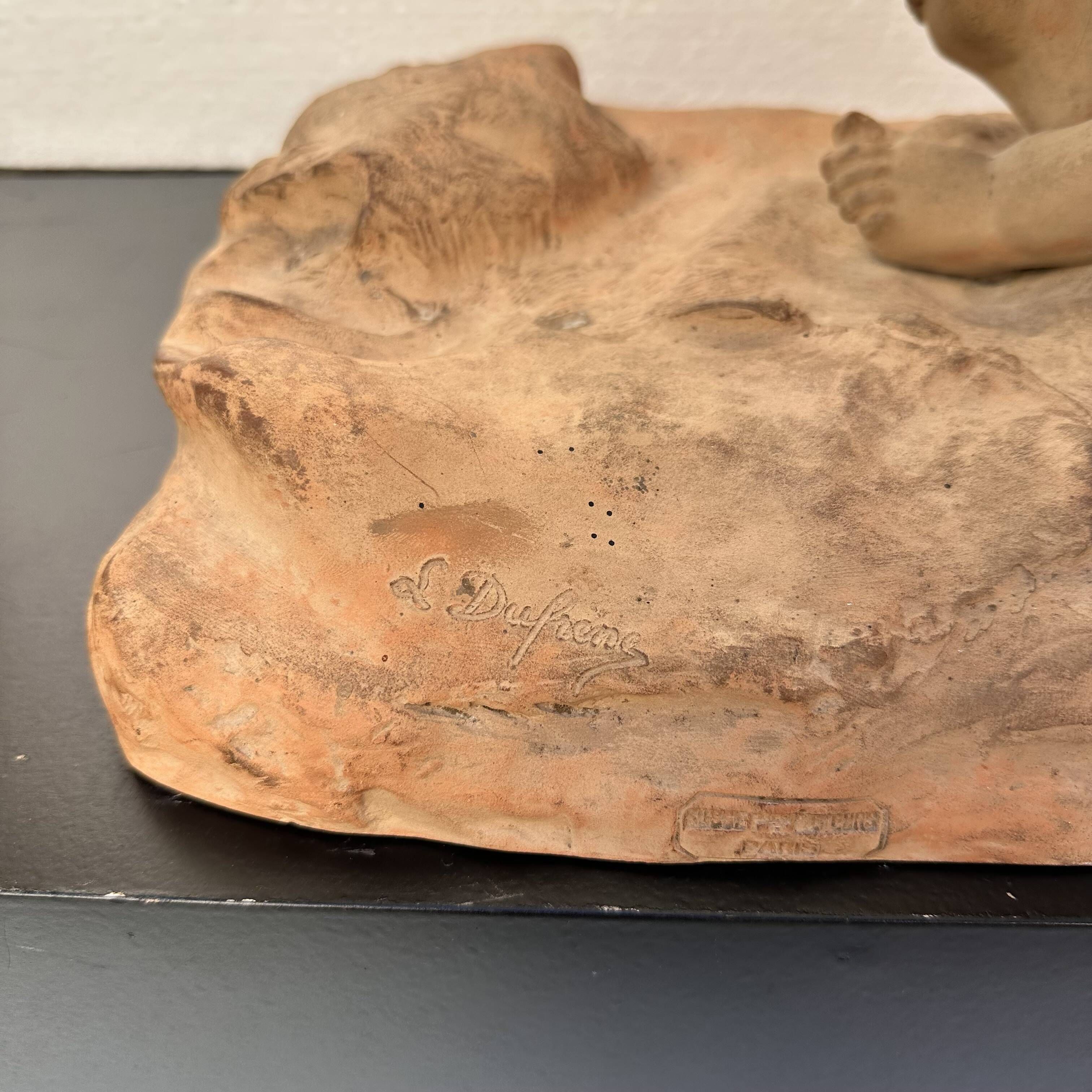Sculpture "Putto on Lion Skin" in terracotta, Léon Dufrène, circa 1900 – France