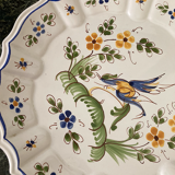 Old plate in Earthenware De Moutiers