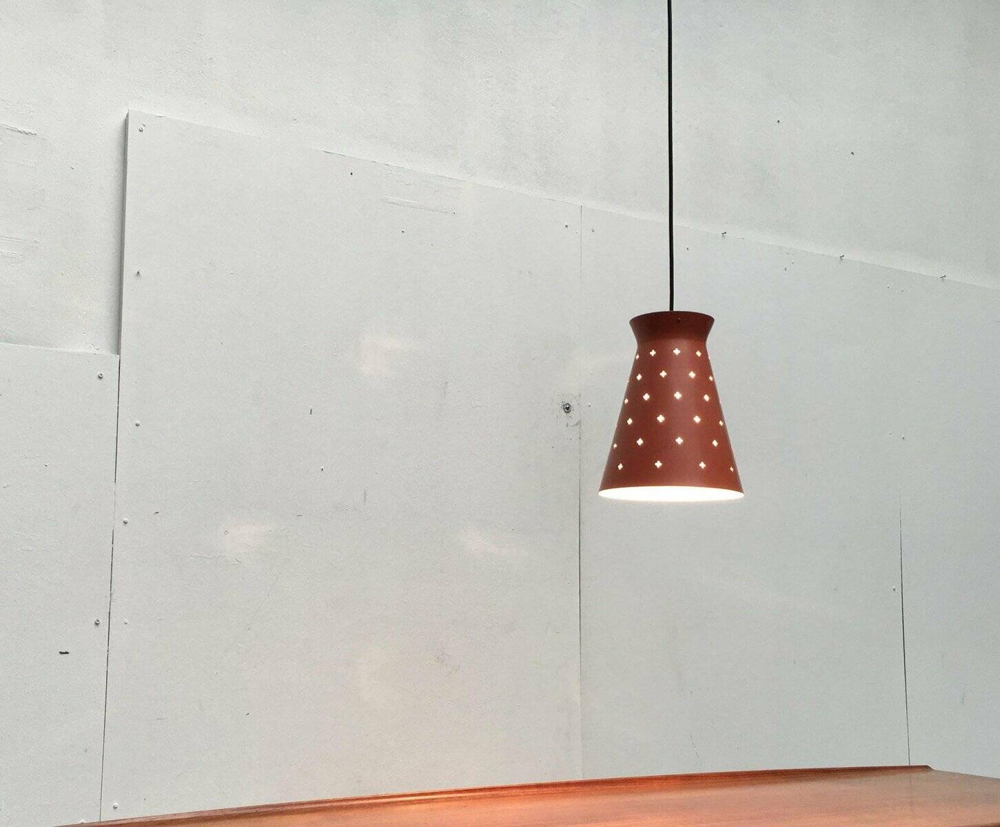 Perforated metal pendant light, mid-century design, 1960s.