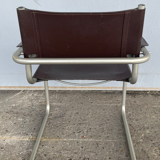 Fauteuil en cuir ancien
