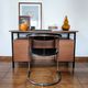 Fauteuil cantilever vintage cuir noir & chrome – années 70/80