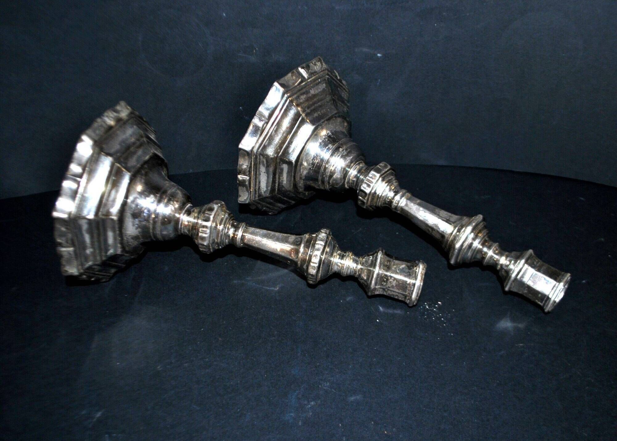 Pair of antique octagonal candlesticks in silvered bronze, Regency style.
