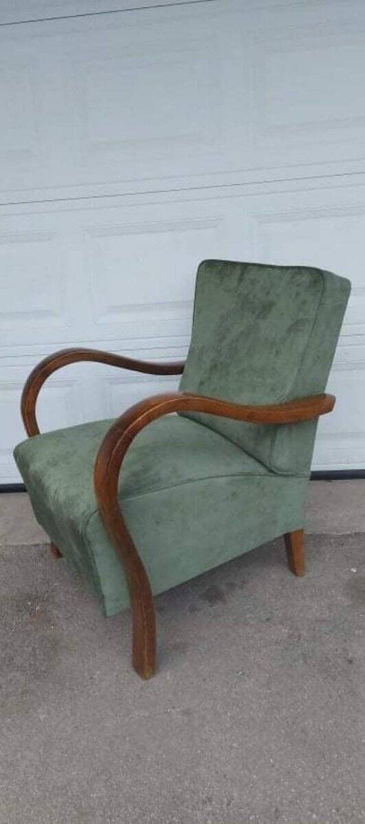 Set of 2 green Art Deco velvet armchairs, curved wooden frame, 1920s.