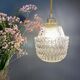 Suspension globe vintage en verre moulé transparent