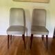 Pair of vintage mahogany and skai chairs