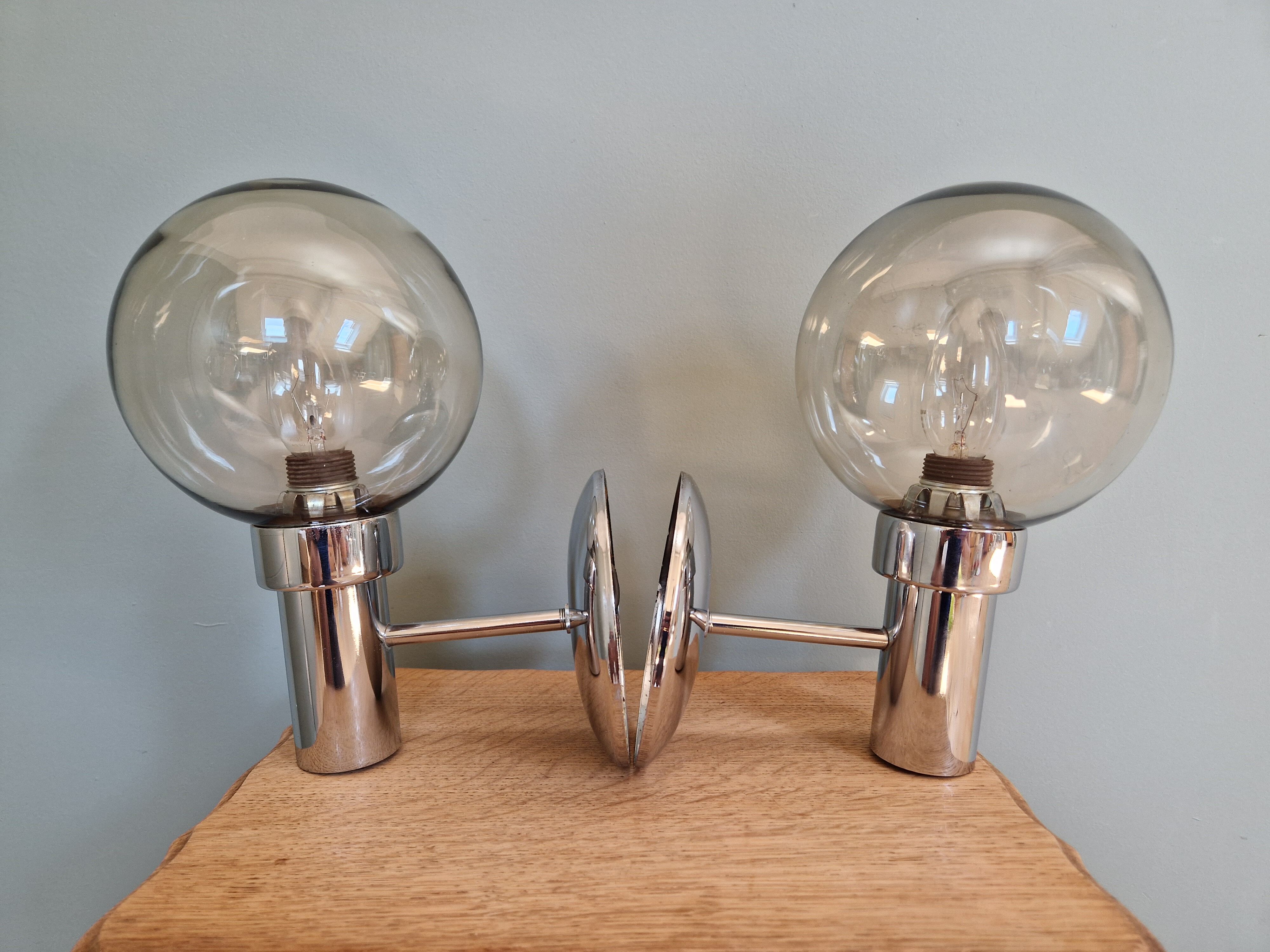 Pair of vintage wall lights in chromed metal and smoked glass, 70s