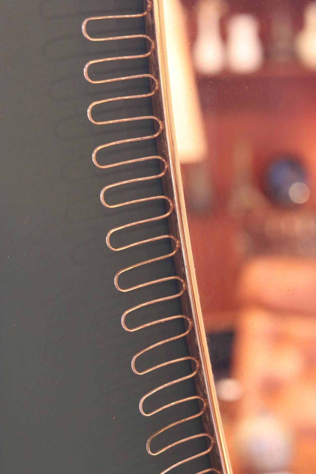 Vintage 50s-60s rear-view mirror, in pierced gold metal.