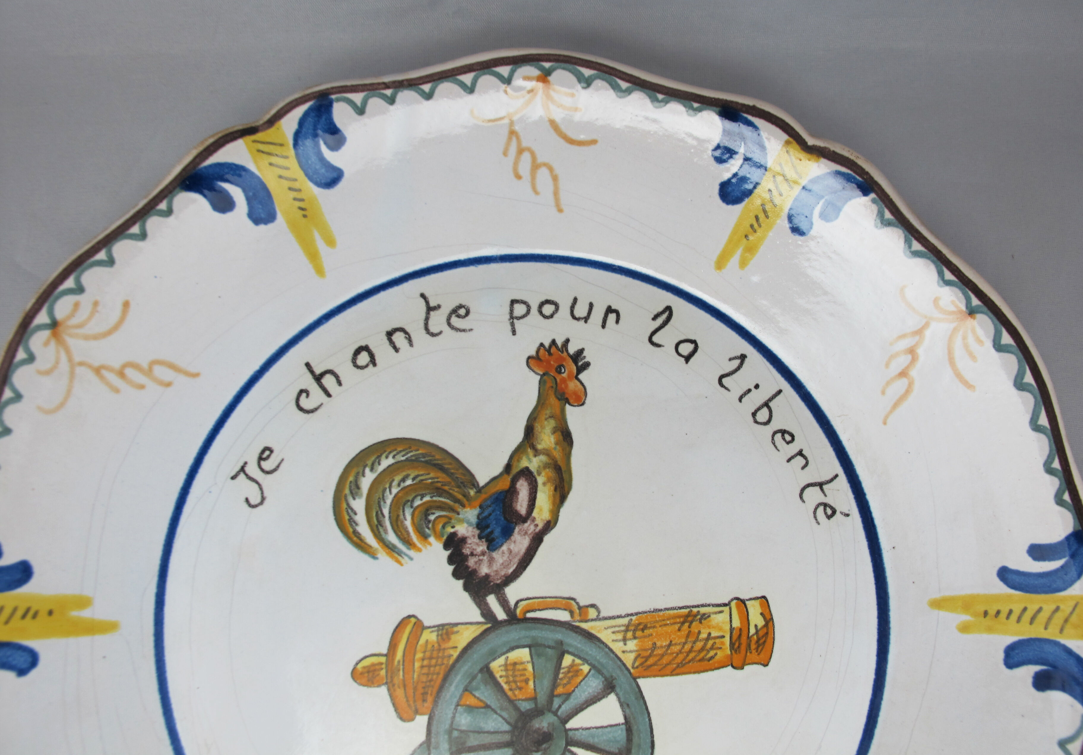 Geo Matel earthenware plate copy of old Nevers model 'I sing for freedom'