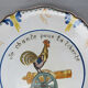Geo Matel earthenware plate copy of old Nevers model 'I sing for freedom'