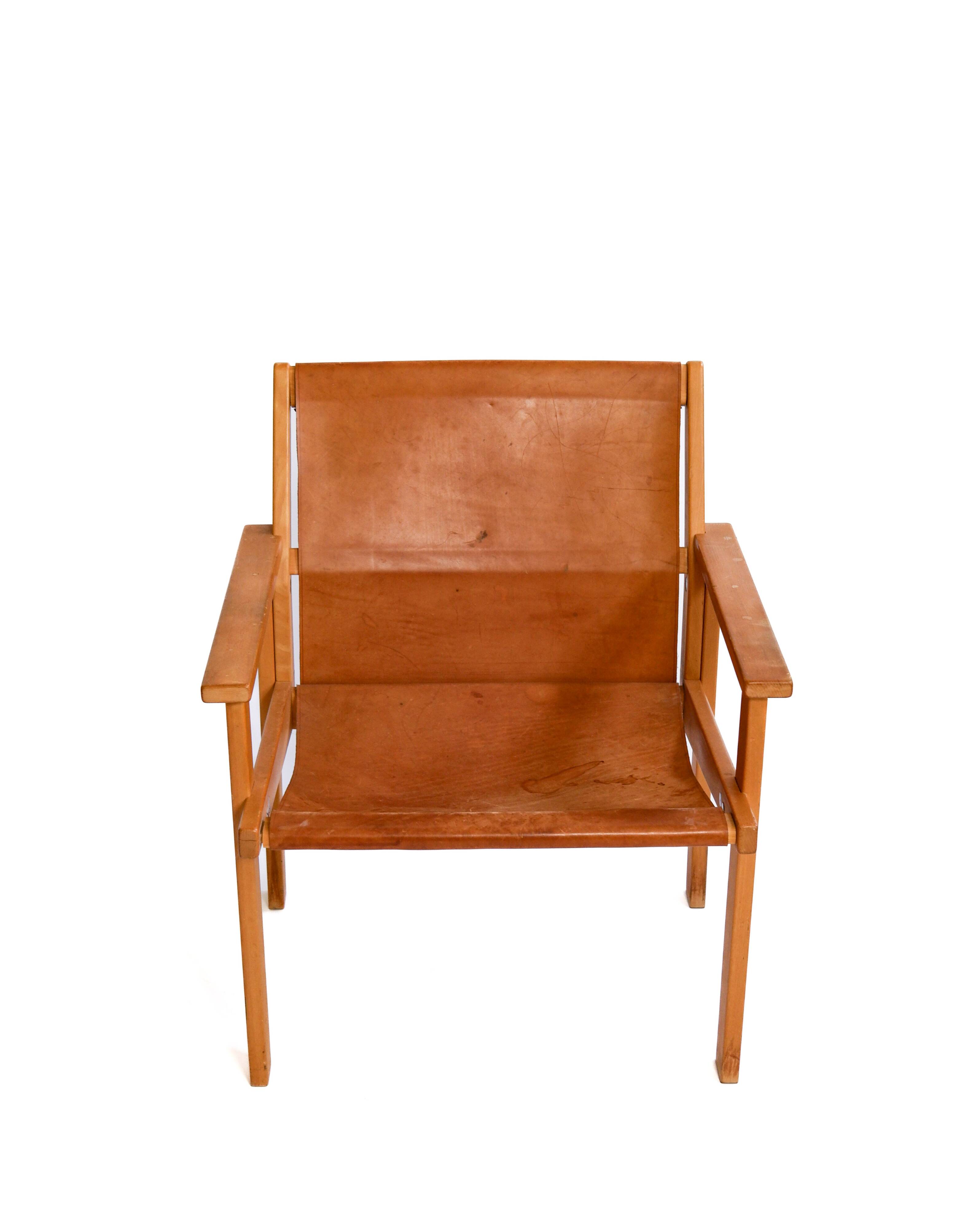 Rare Hans Agne Jakobsson armchair in leather and wood. Circa 1970