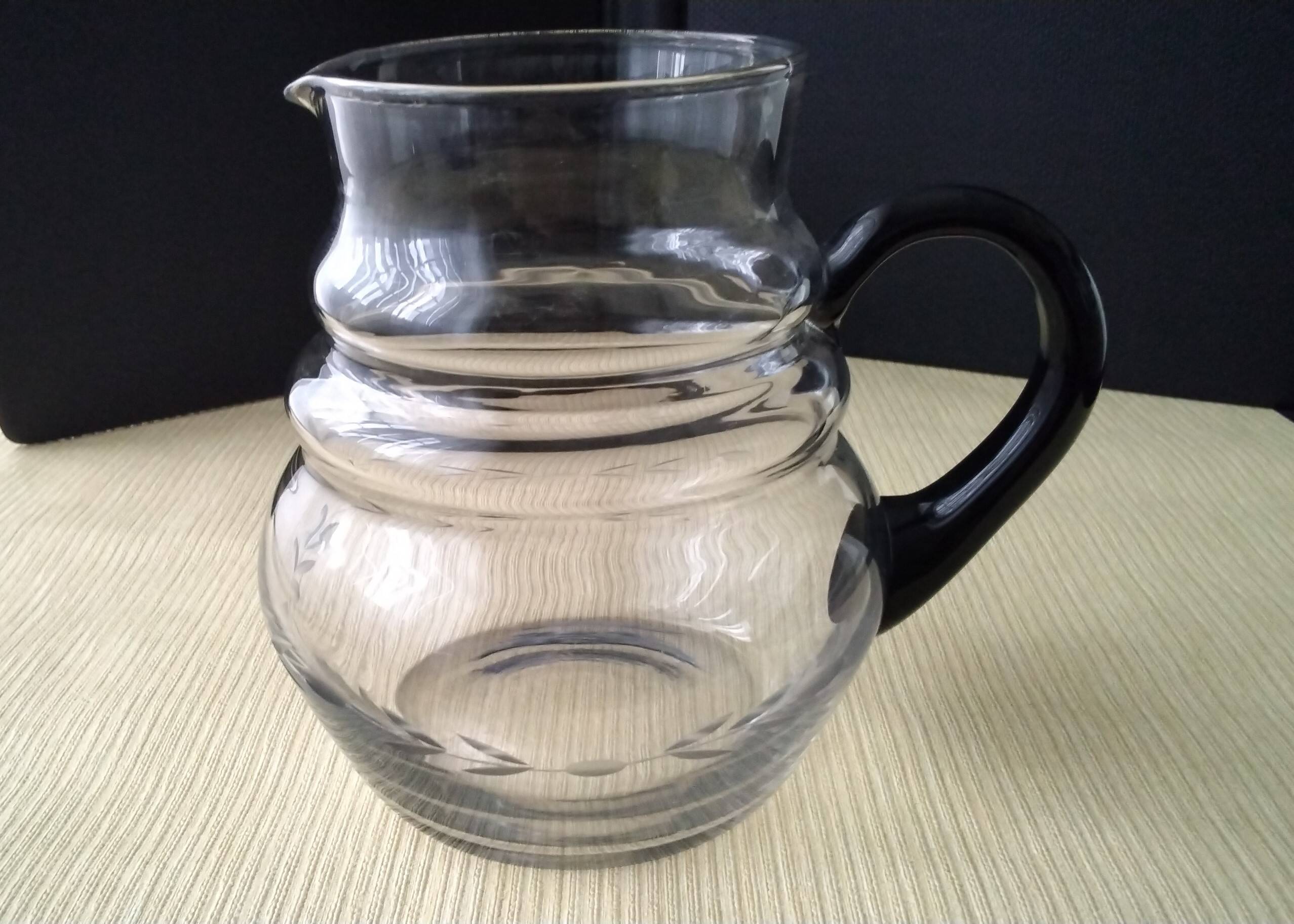 Water jug, blown glass carafe. Delicate engraved decoration