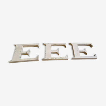 Patinated zinc letters E