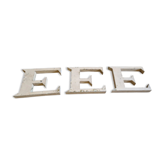 Patinated zinc letters E