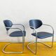 Pair of Effezeta chairs, tubular structure, chrome and black skai