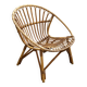 Vintage 1960s rattan shell chair – an icon of bohemian design.