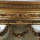 Louis XVI style showcase in wood and gilded stucco, circa 1900