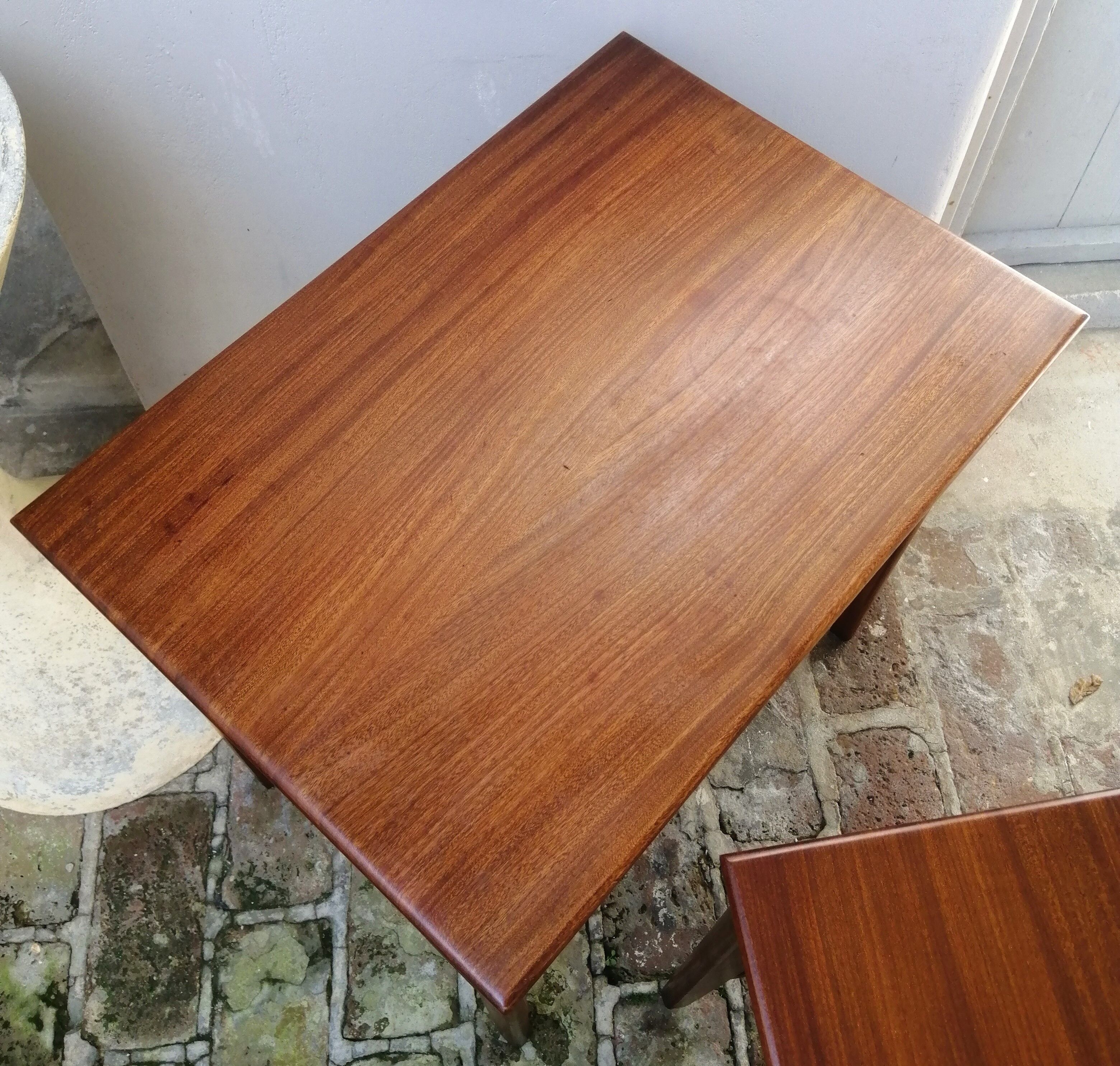 Pull-out tables from the 60s in solid exotic wood published by Younger