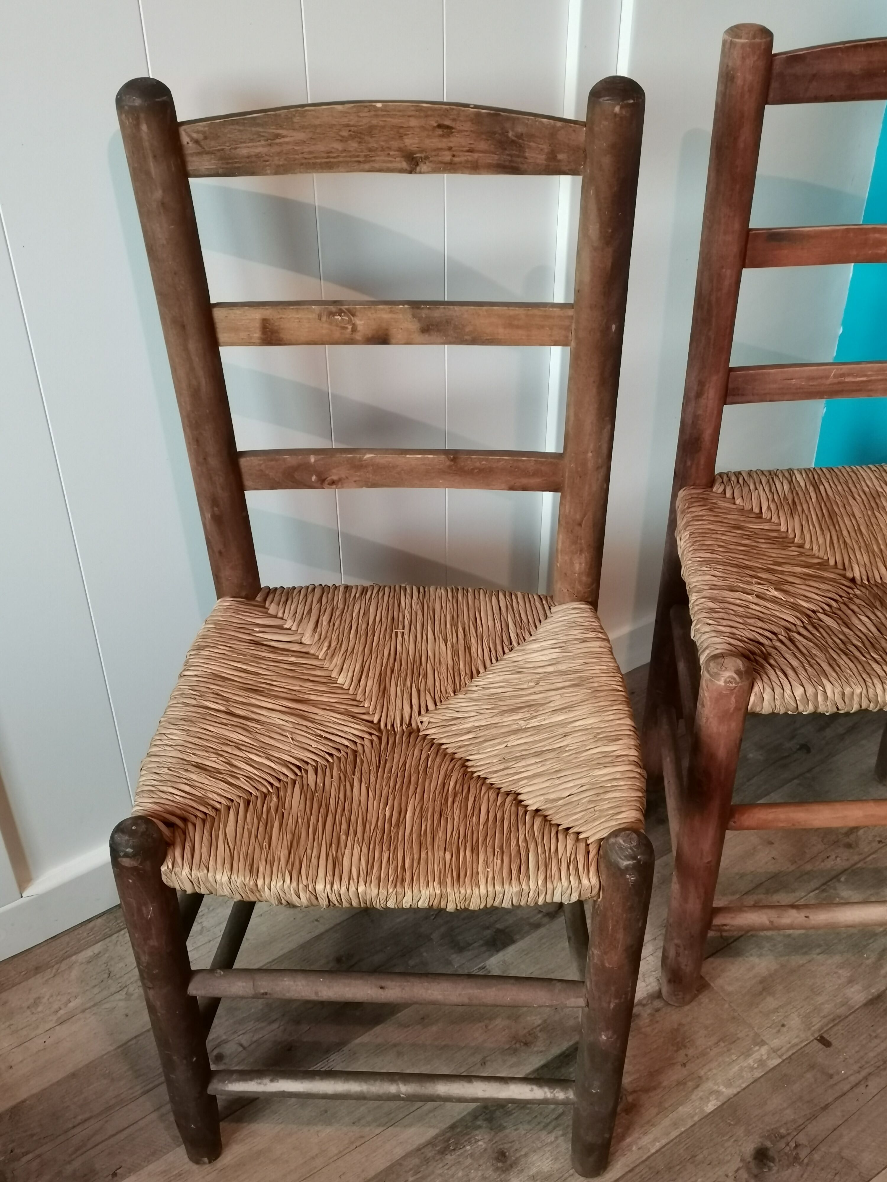 St of 2 raw wood and straw chairs