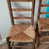 St of 2 raw wood and straw chairs