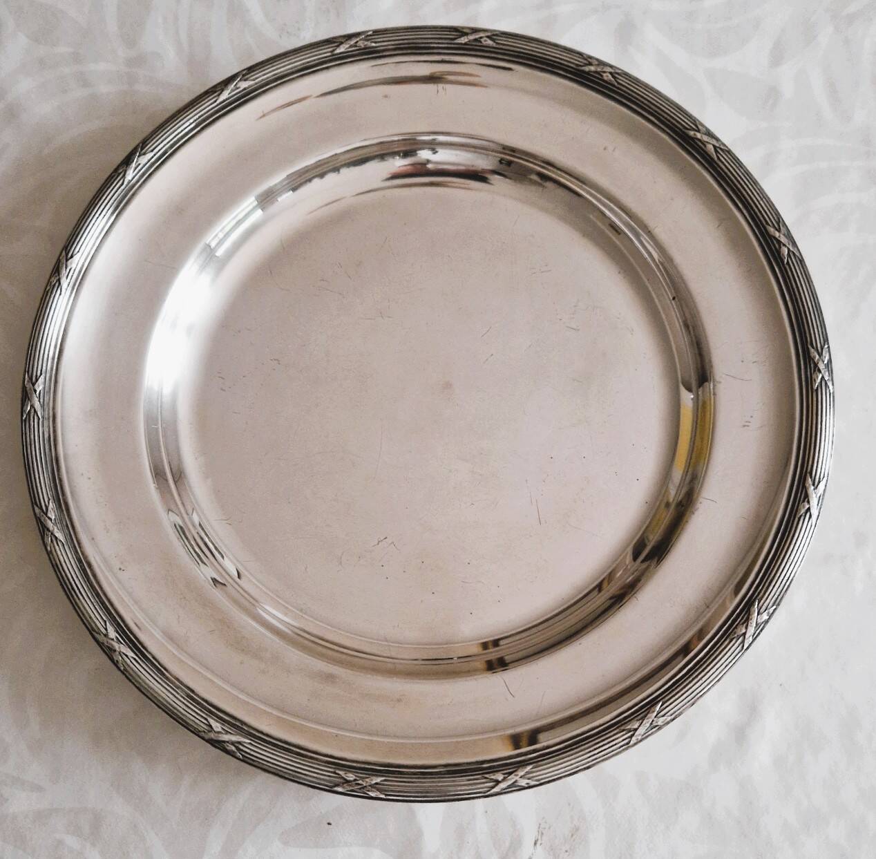 Round silver-plated metal serving dish by Cristofle