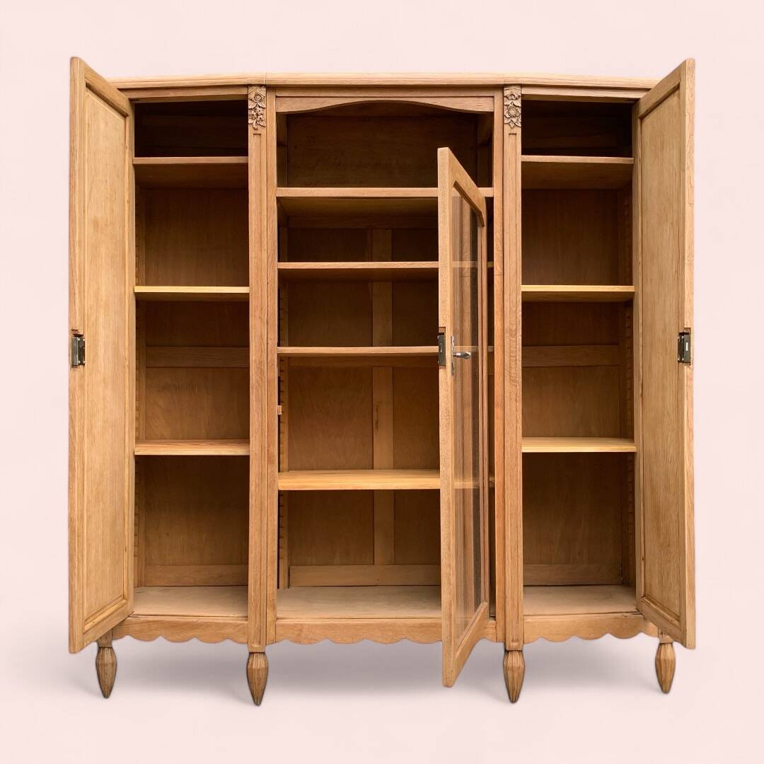 Parisian Art Deco asymmetrical glass cabinet in raw oak, 1930