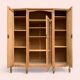 Asymmetrical Art Deco glass-fronted Parisian wardrobe in raw oak, 1930.