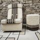 Boucle wool fireside chair and its 1970" vintage pouf
