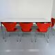 Large table design USM Haller with a white top and chrome structure.