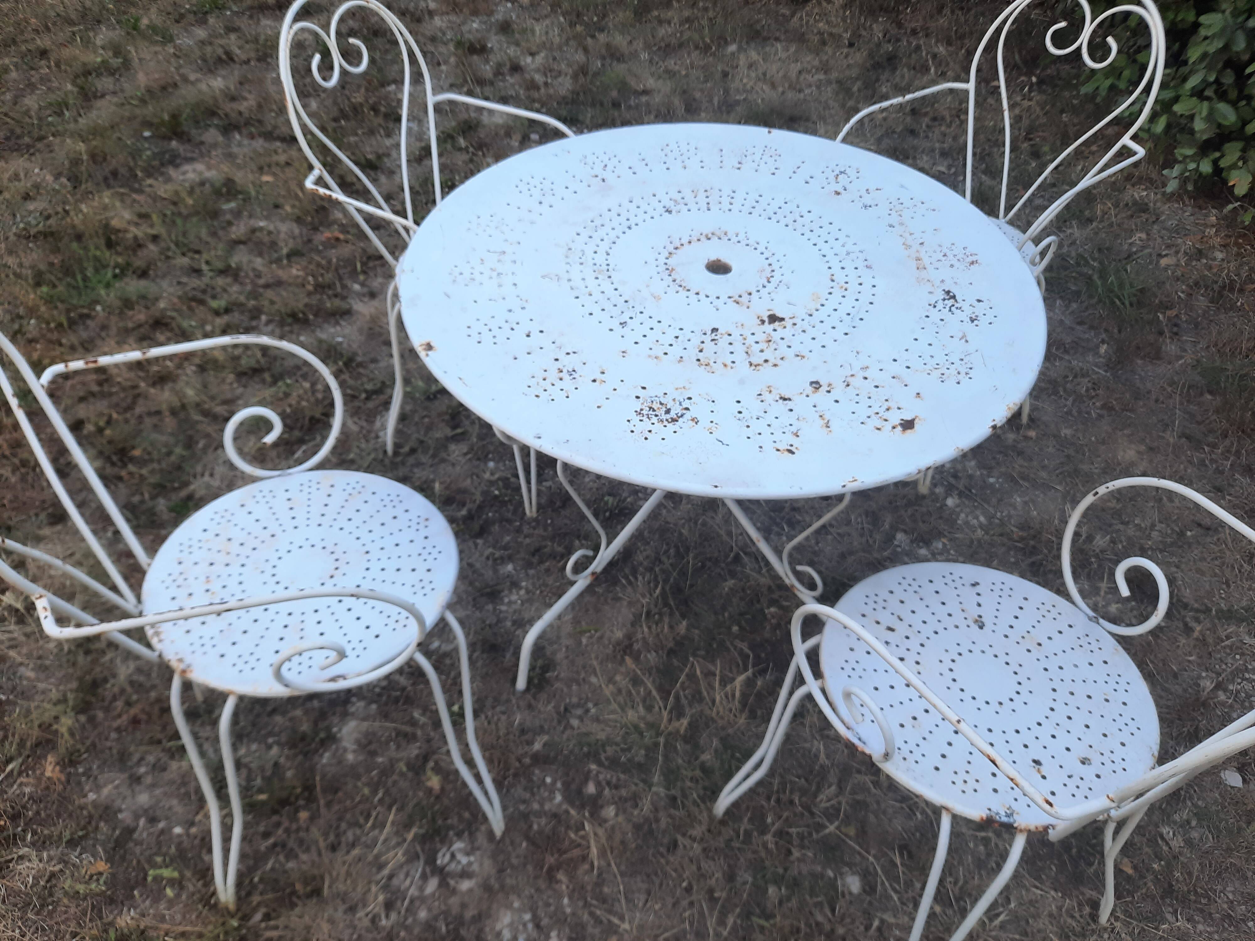 Antique wrought iron garden furniture