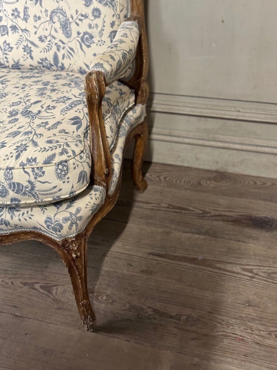 Louis XV bench in carved wood with oak patina, 18th century