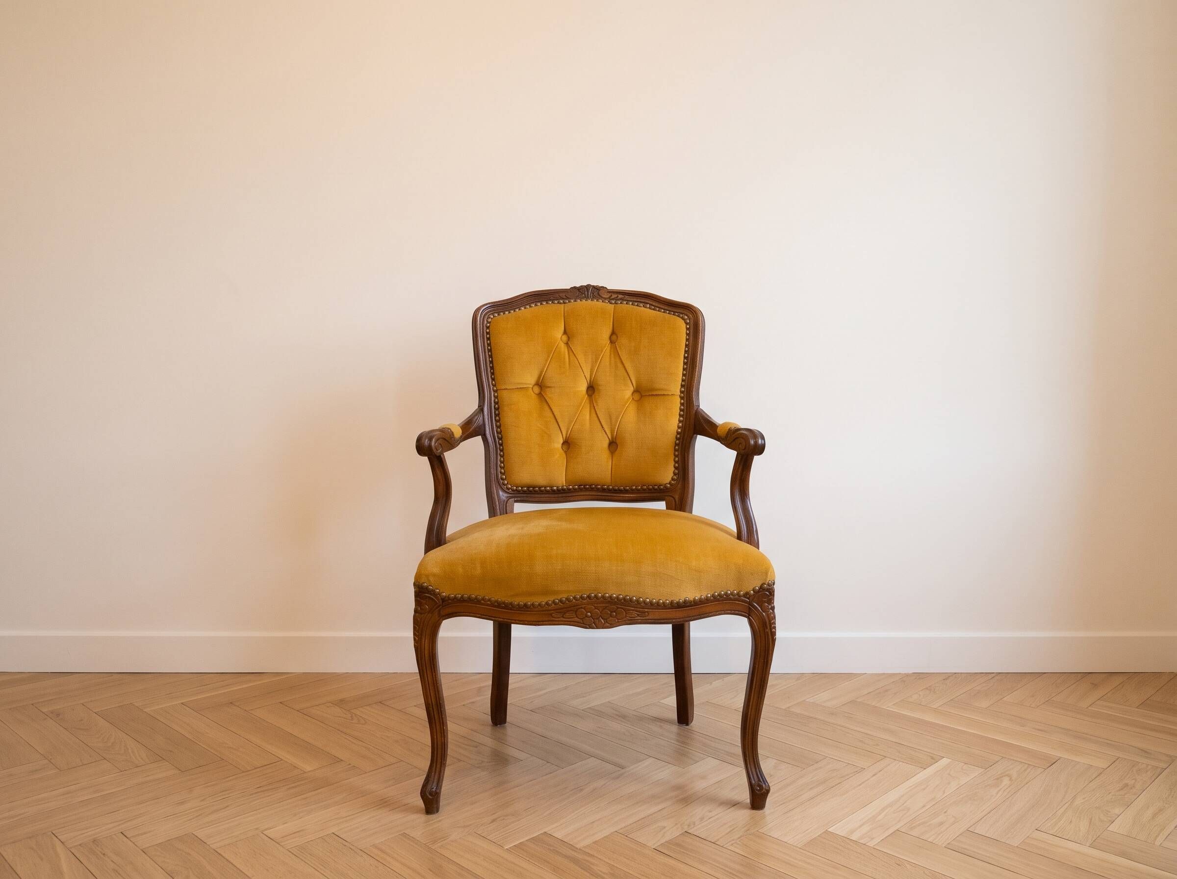 Louis XV style armchair in yellow velvet.