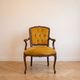 Louis XV style armchair in yellow velvet.