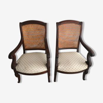 Pair of armchairs with a canned back