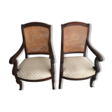 Pair of armchairs with a canned back
