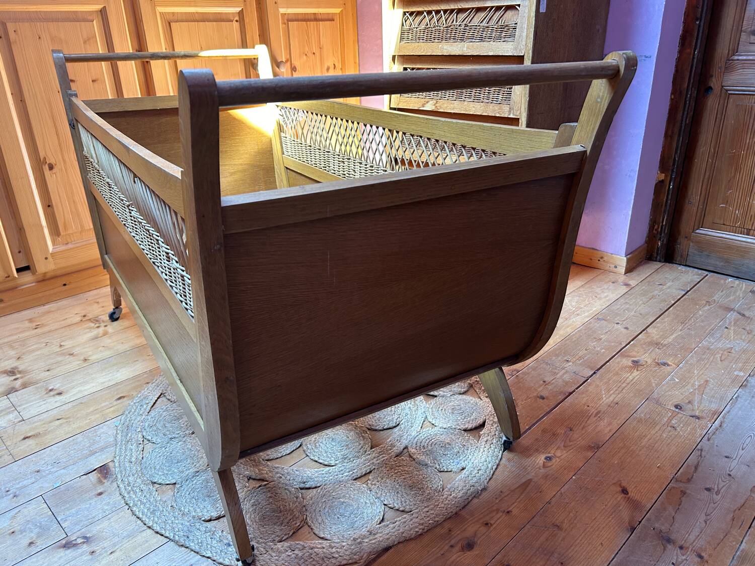 Wooden and rattan children's bed from the 60s