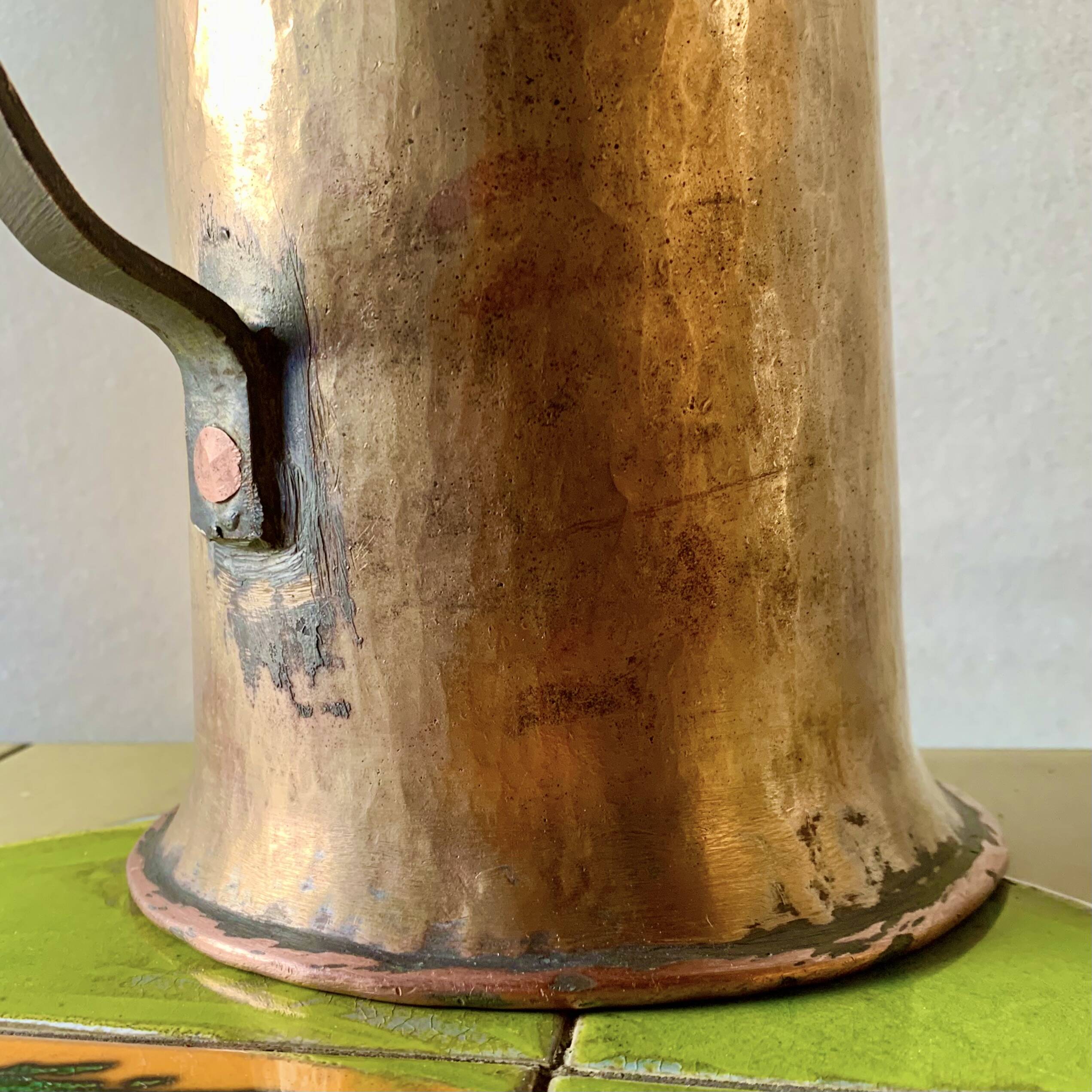 Old hammered copper water jug - artisanal work