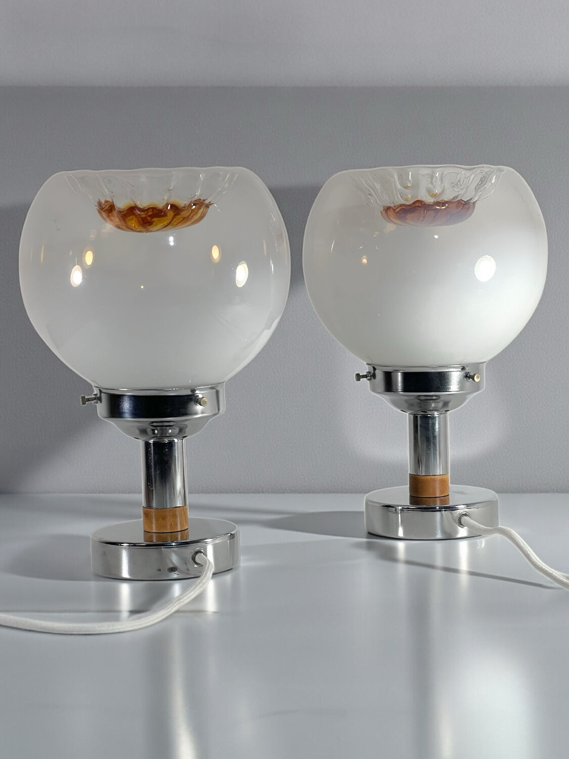 Pair of table lamps with large Murano globes from the 70s.