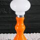 Table lamp or bedside lamp from the 1960s-70s in orange and chrome.
