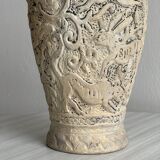 Poterie artisanale ancienne à tête de mouton