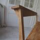 Church bench, bed end in pitch pine with light oak wax finish.
